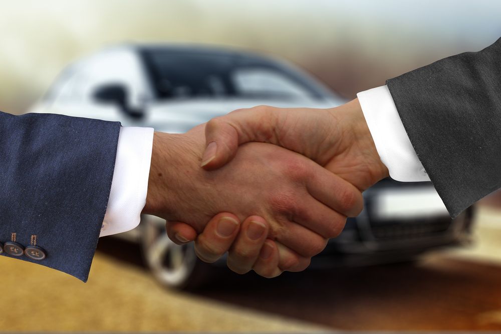 Do I have to buy insurance from the car dealership's agent?